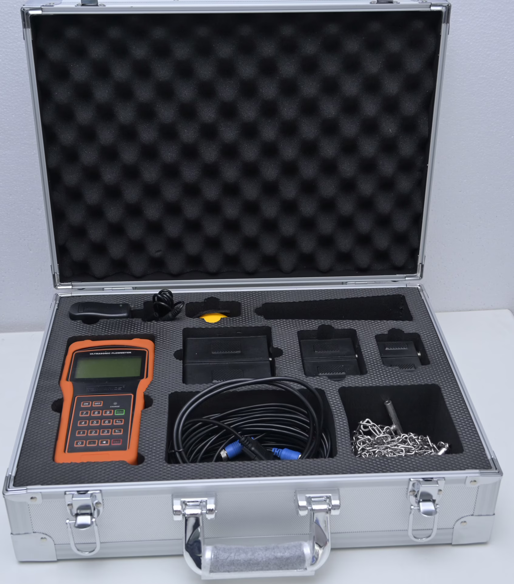 Hand held ultrasonic flow meter